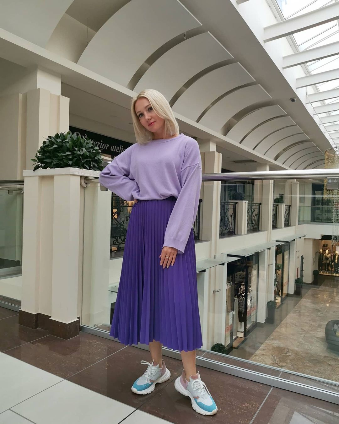 dark purple skirt and lavender shirt