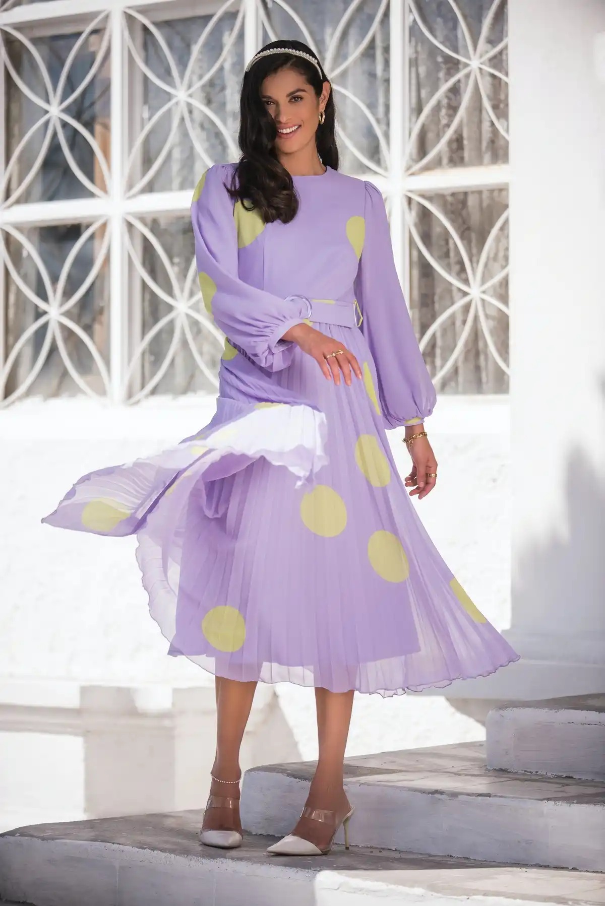 light purple dress with yellow dots and white heels