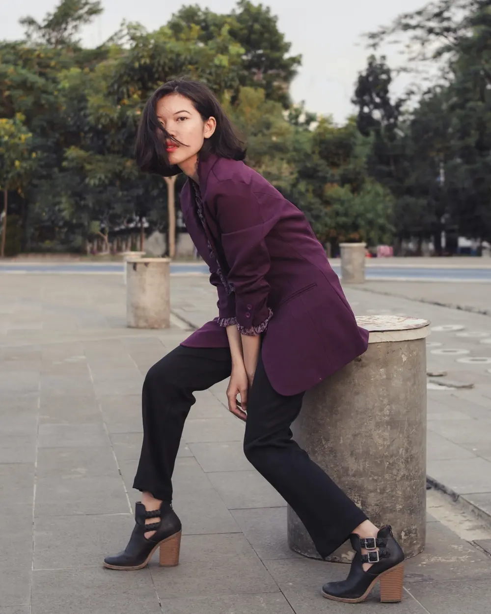 dark purple blazer outfit with black pants and booties