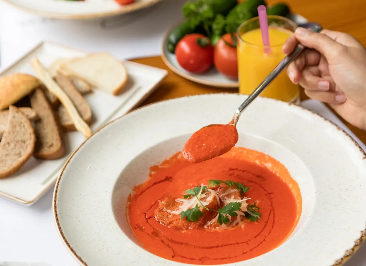 thick tomato soup with bread
