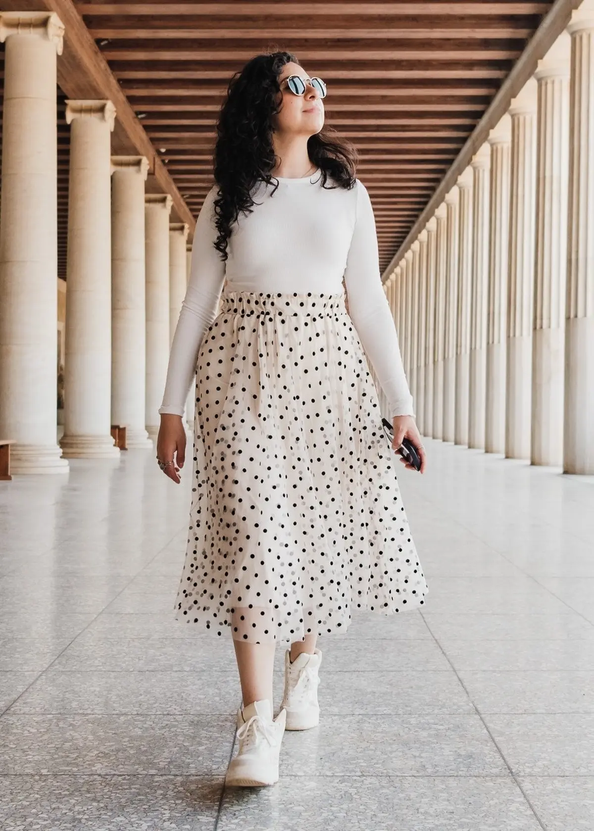 polka dots pleated skirt paired with plain white blouse