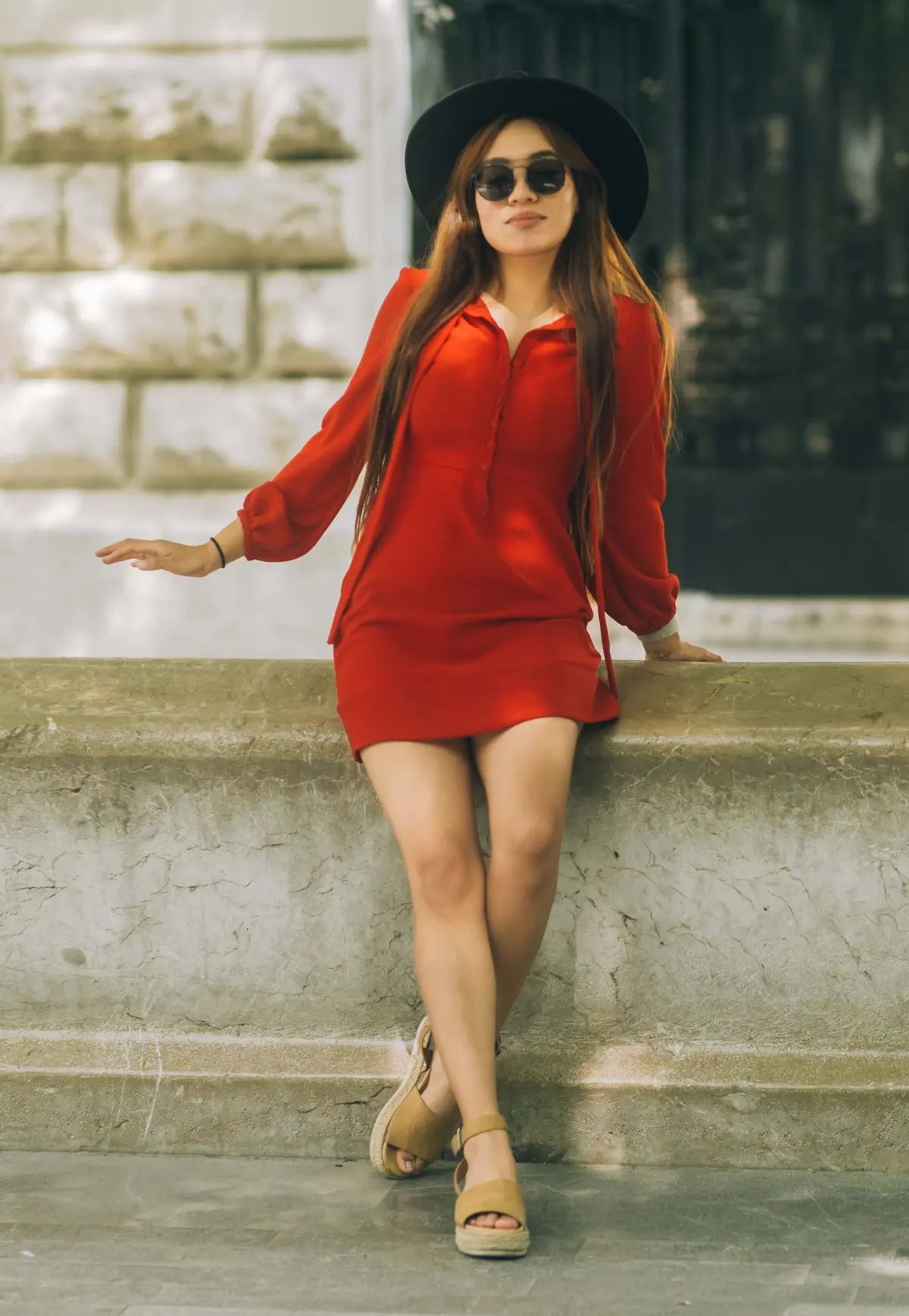 red chiffon dress with long sleeves paired with sand espadrille sandals