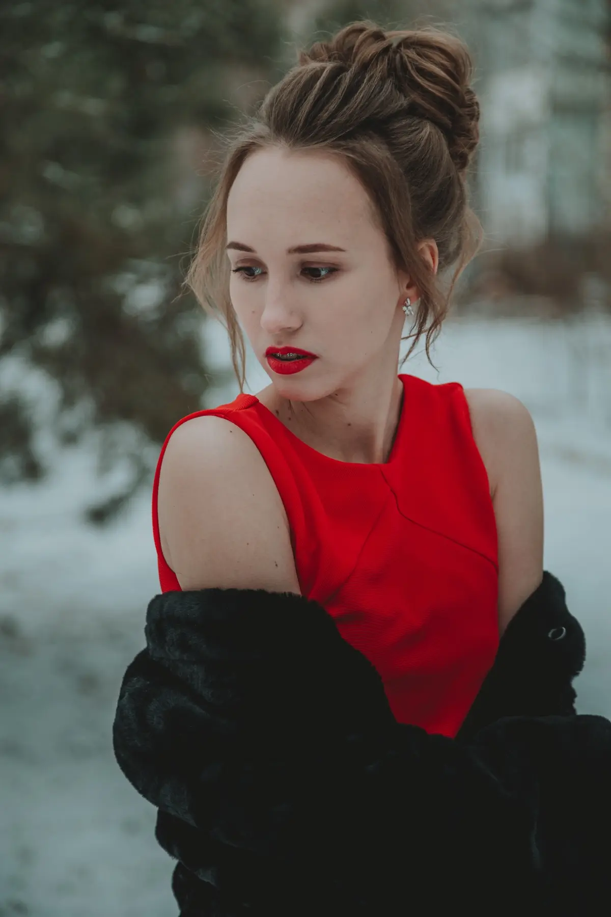 red dress paired with black winter jacket