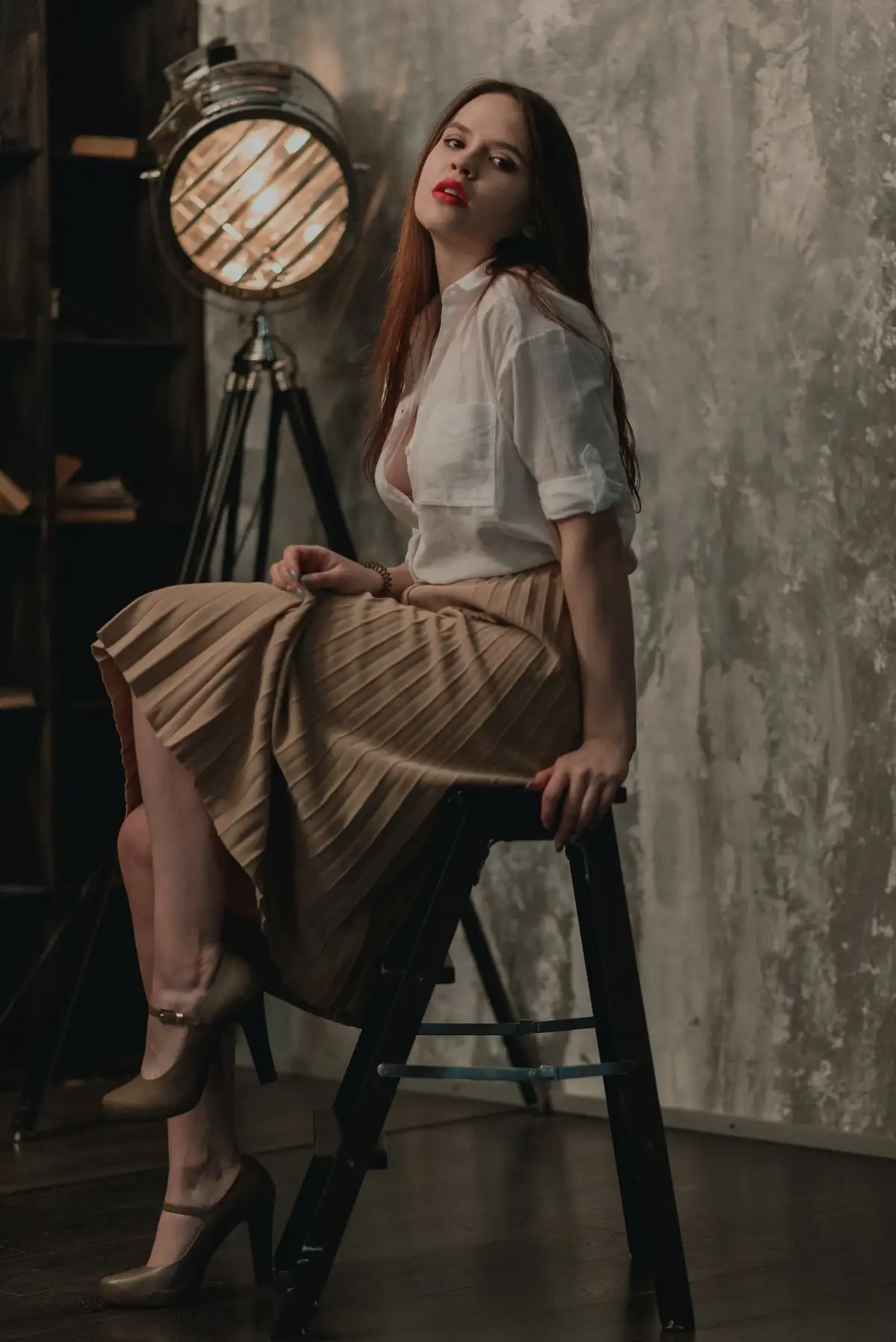 brown pleated cotton skirt paired with linen shirt