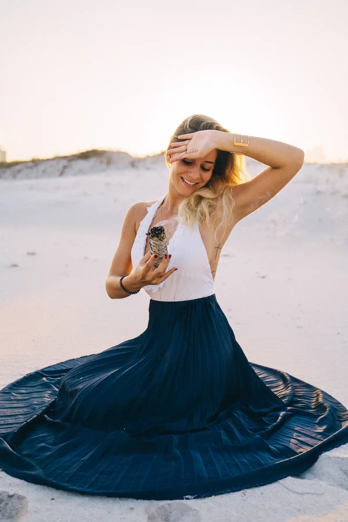 long pleated skirt paired with v neck top