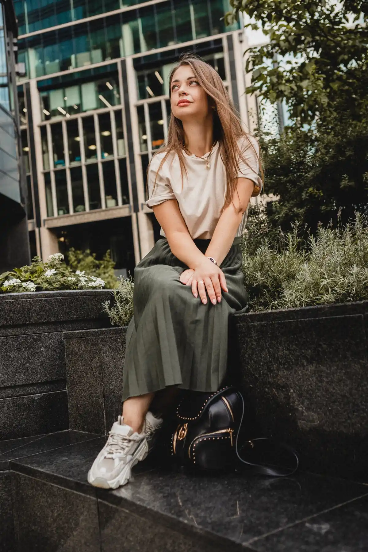 pleated skirt casual outfit with sneakers and t-shirt