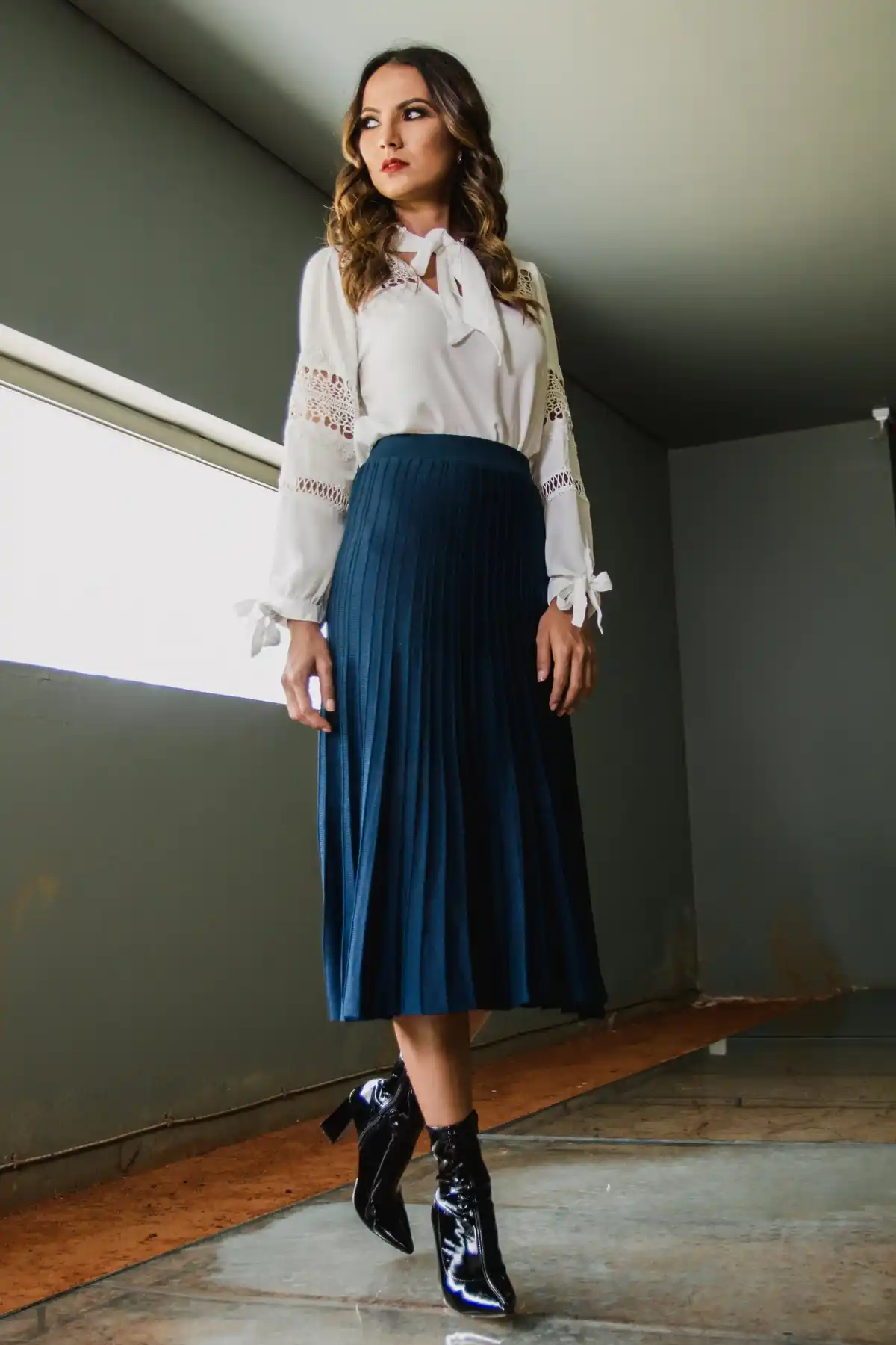 pleated skirt work outfit with white shirt